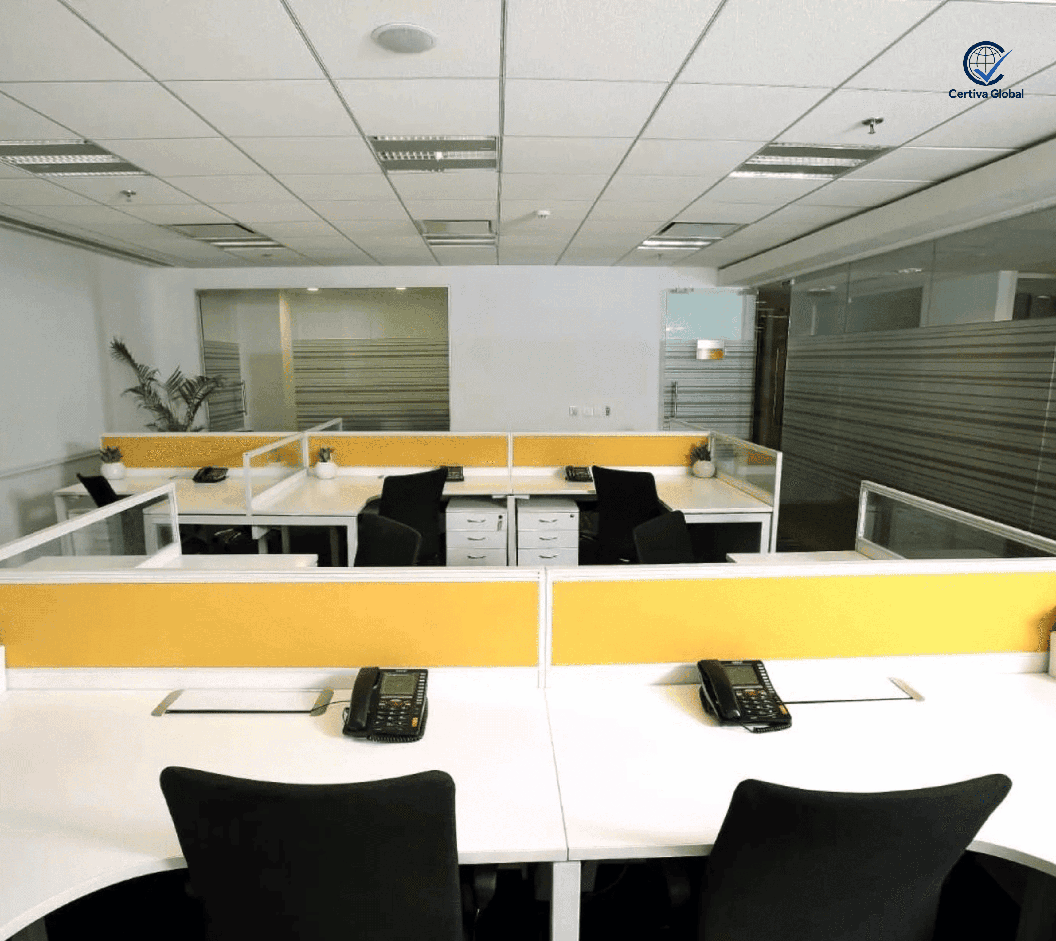 Certiva Global's Hyderabad office workstation area